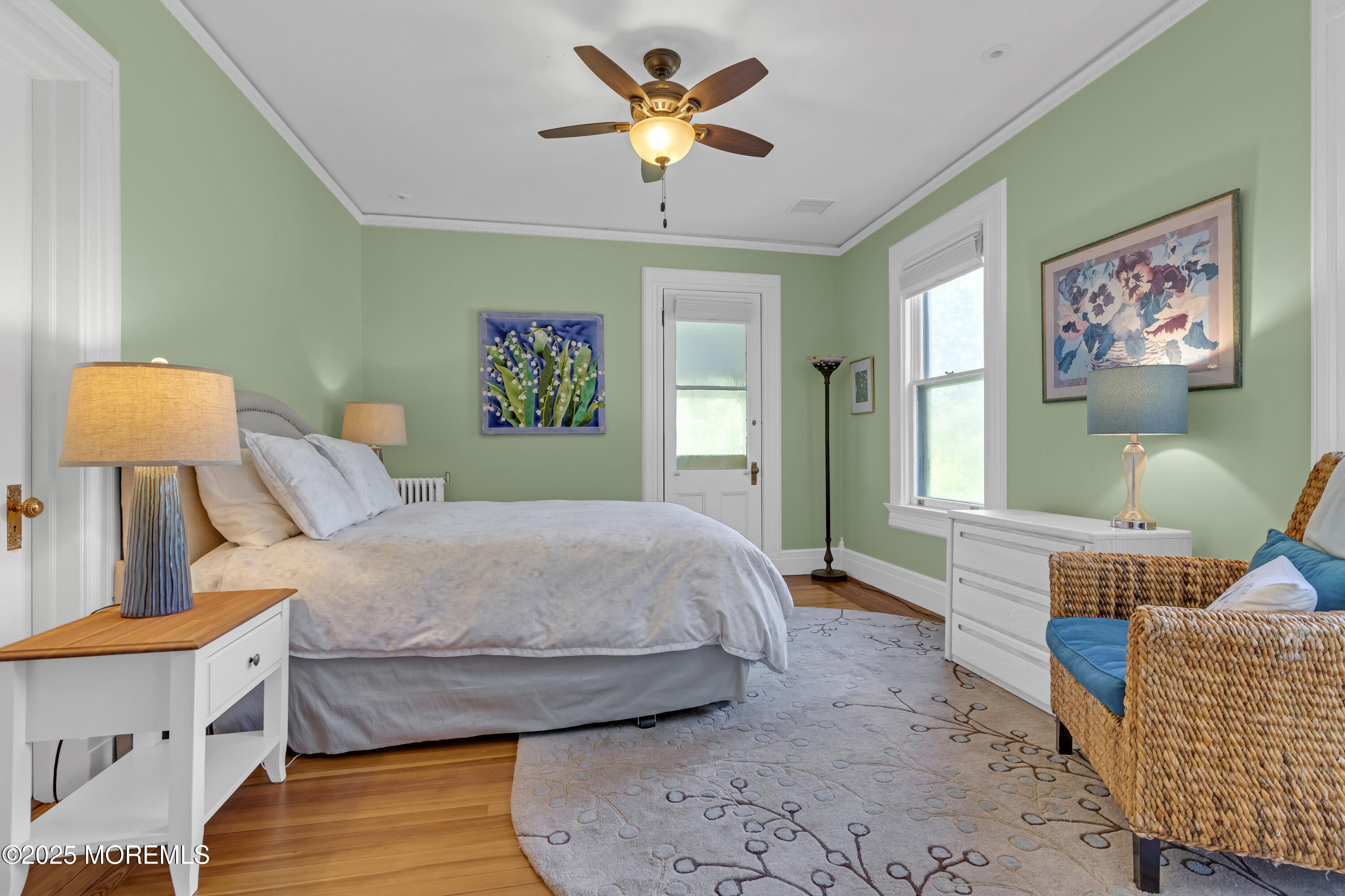 458 Navesink River Road Red Bank, NJ 07701 - Photo 68 of 118 a bedroom with a bed and a chandelier
