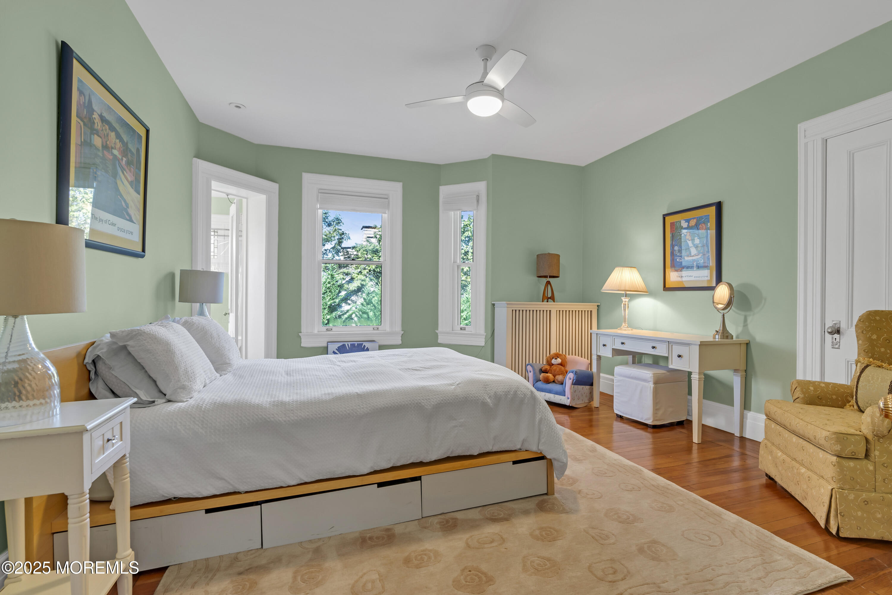 458 Navesink River Road Red Bank, NJ 07701 - Photo 72 of 118 a bedroom with a bed wooden floor and window