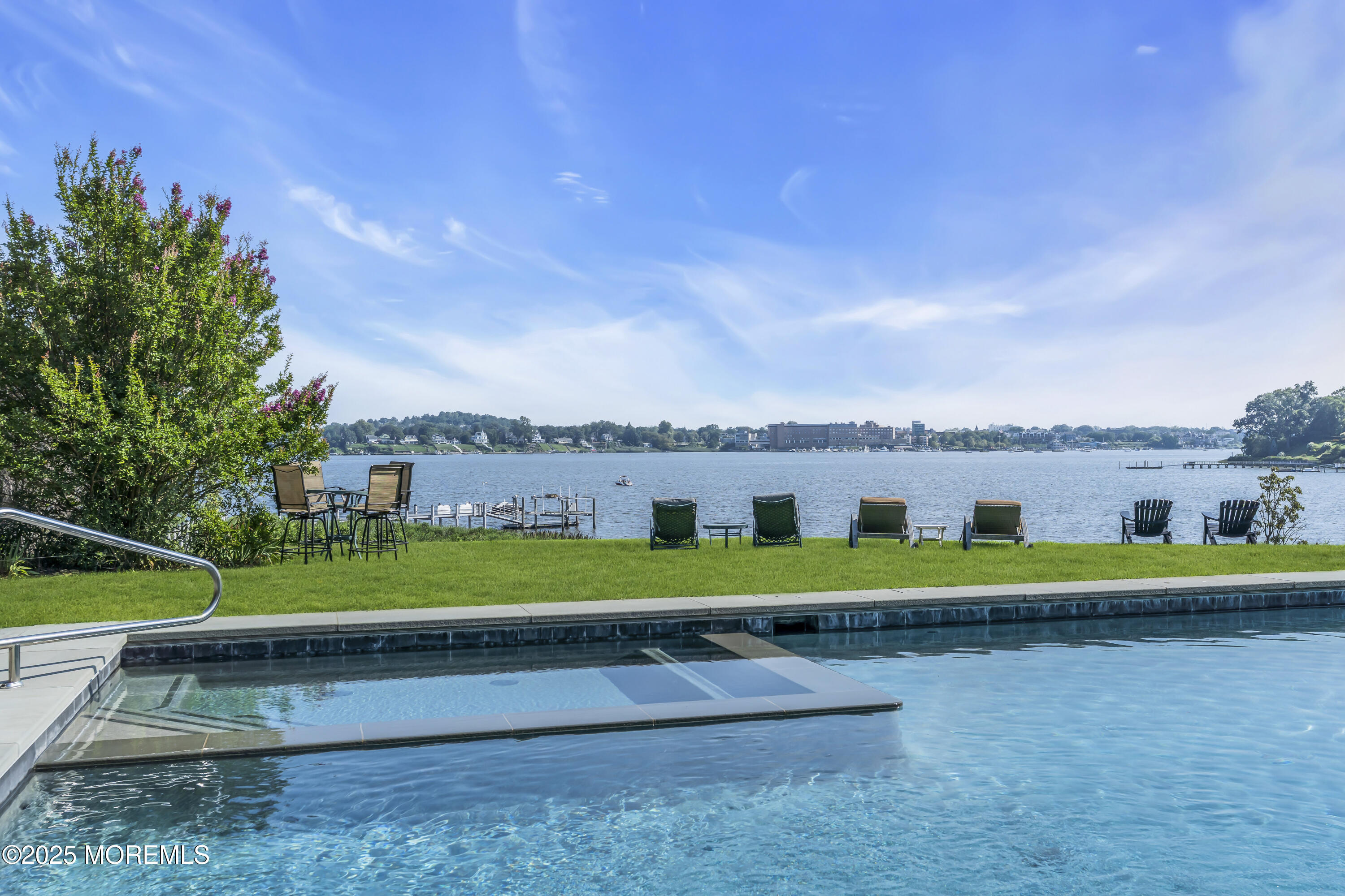 458 Navesink River Road Red Bank, NJ 07701 - Photo 8 of 118 a front view of a house with a yard and trees