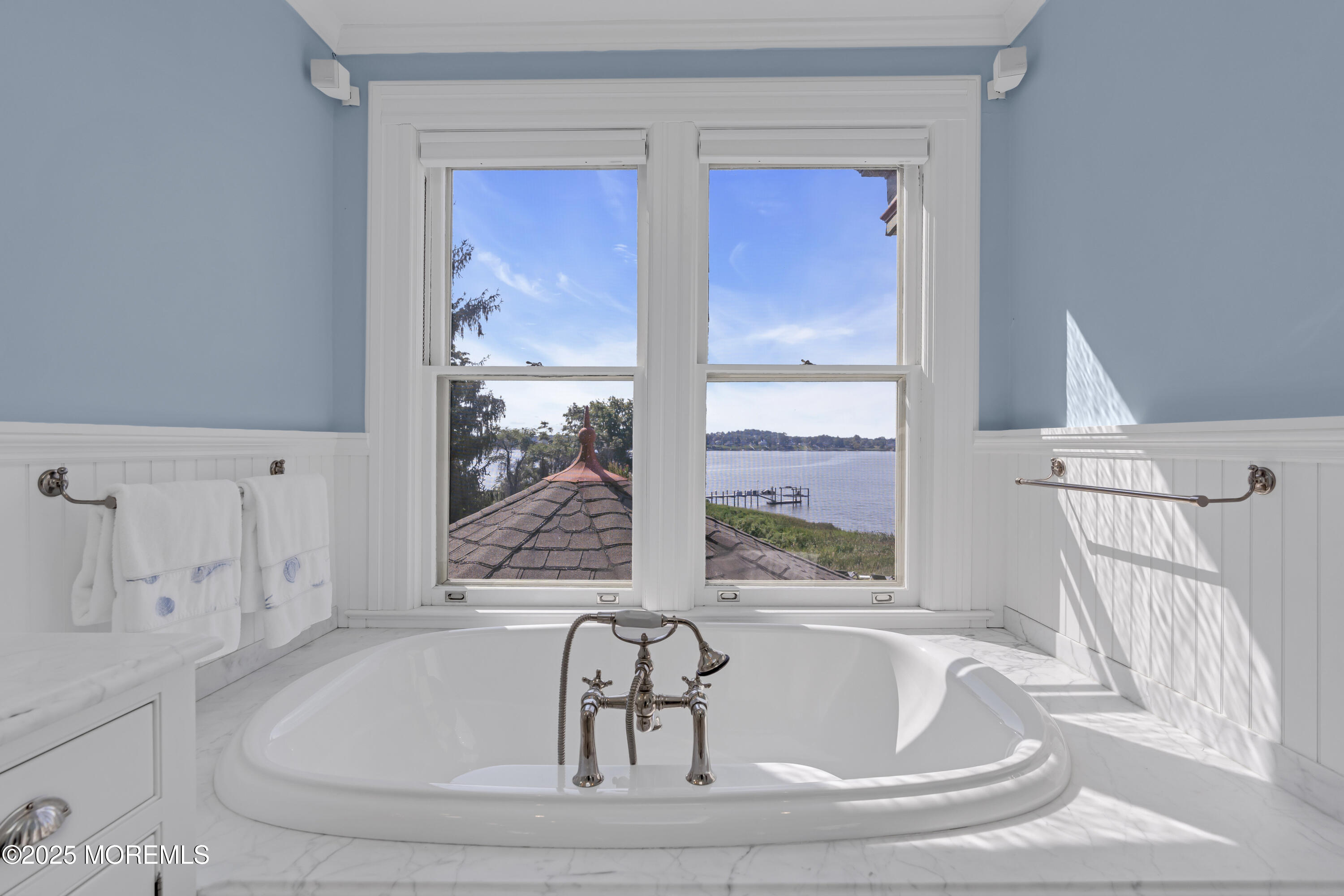 458 Navesink River Road Red Bank, NJ 07701 - Photo 81 of 118 a white bath tub sitting in a bathroom next to a window