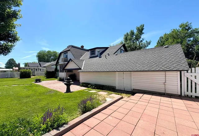 a house view with a garden space