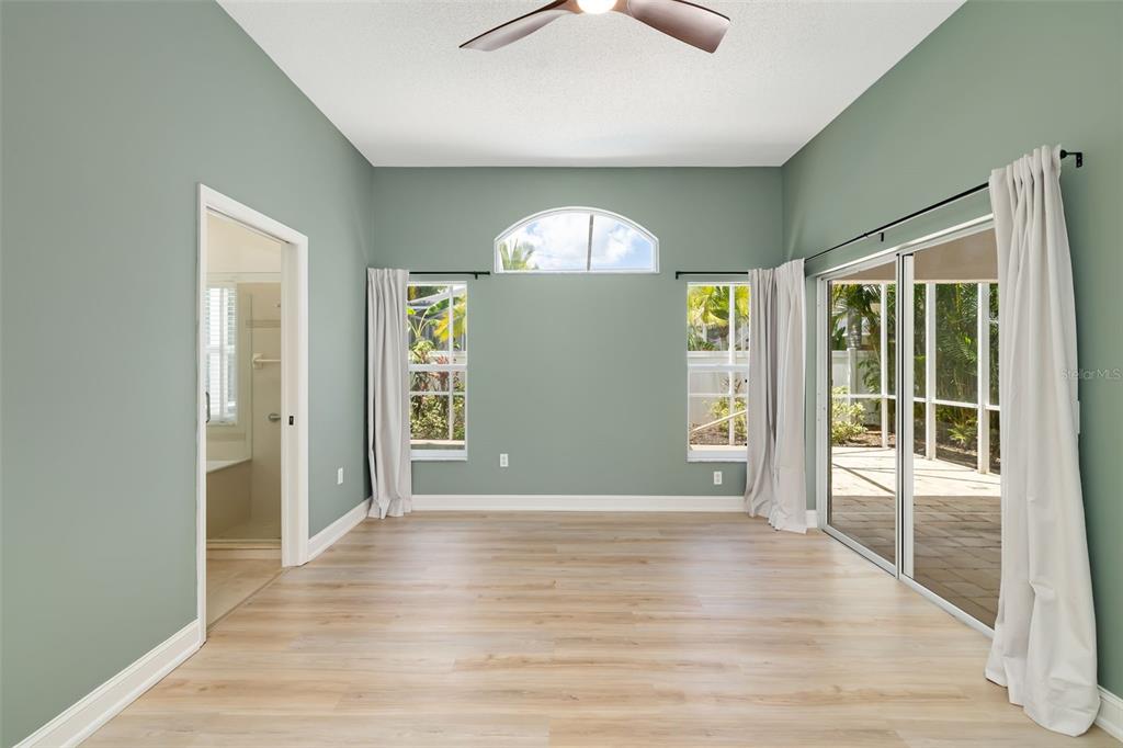 6226 Blueflower Court Lakewood Ranch, FL 34202 - Photo 28 of 81 wooden floor in an empty room with a window