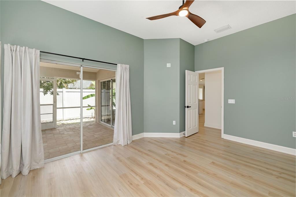 6226 Blueflower Court Lakewood Ranch, FL 34202 - Photo 30 of 81 wooden floor in an empty room with a window
