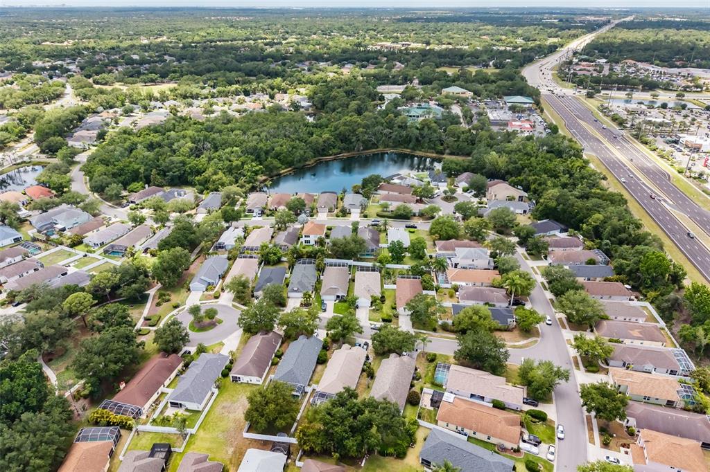 6226 Blueflower Court Lakewood Ranch, FL 34202 - Photo 47 of 81 an aerial view of residential houses with outdoor space