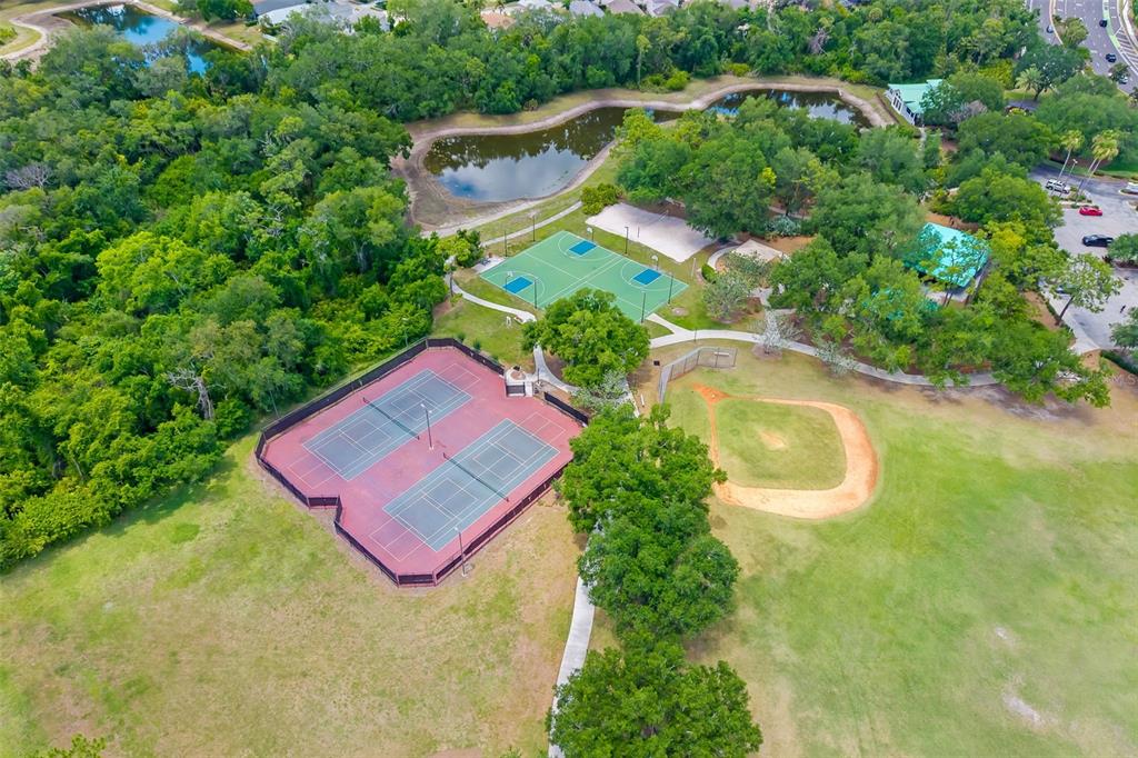 6226 Blueflower Court Lakewood Ranch, FL 34202 - Photo 59 of 81 an aerial view of residential house with outdoor space and swimming pool