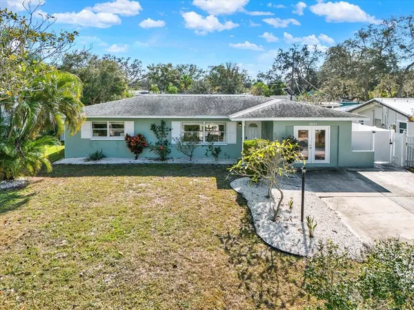 front view of a house with a yard