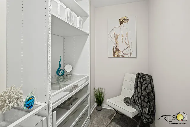 a picture of a room with furniture and wooden floor