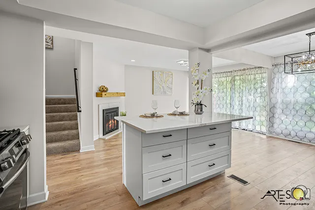 a room with a dresser and a mirror