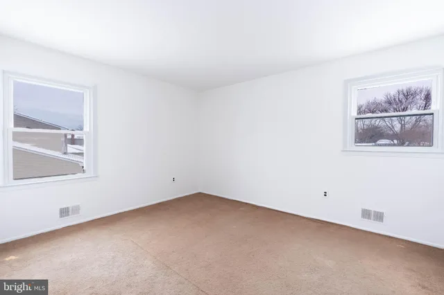 a bathroom with a sink a mirror and a shower