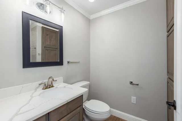 a bathroom with a sink a mirror and shower