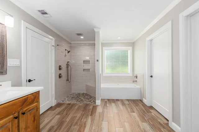 a view of yard with swimming pool and trees in the background