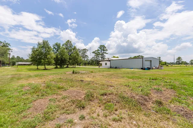 $424,999 | 203 Woodard, Devers, TX 77538