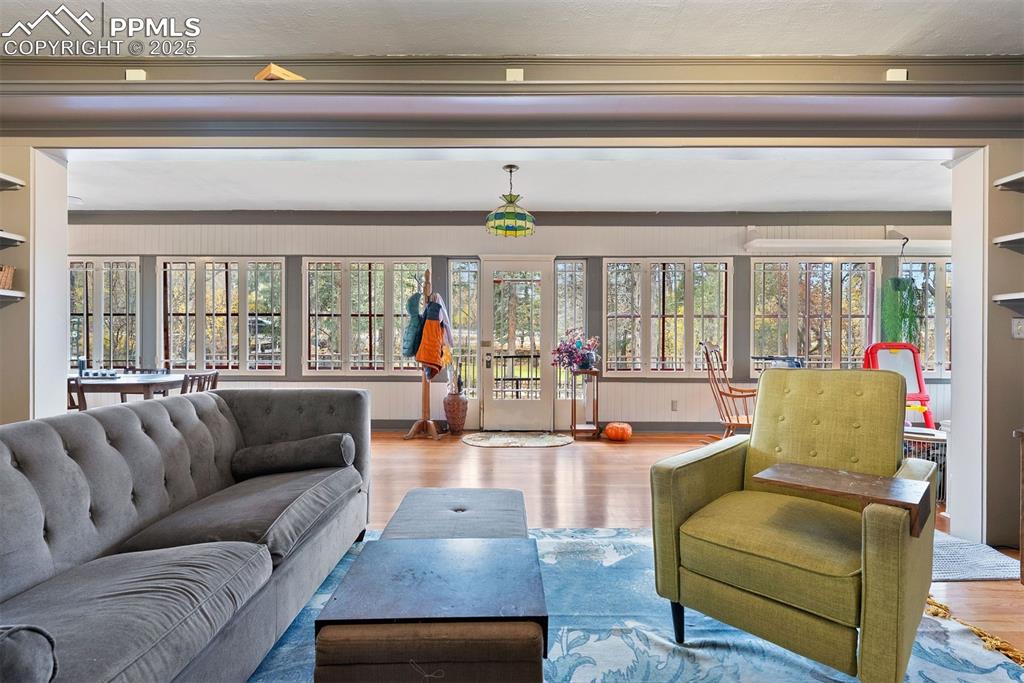 1515 West Cheyenne Road Colorado Springs, CO 80906 - Photo 18 of 50 a living room with furniture and a chandelier