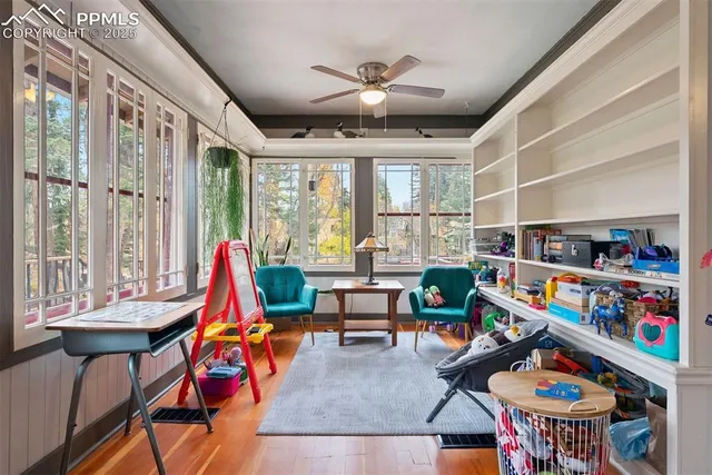 a living room with lots of furniture and a dining table