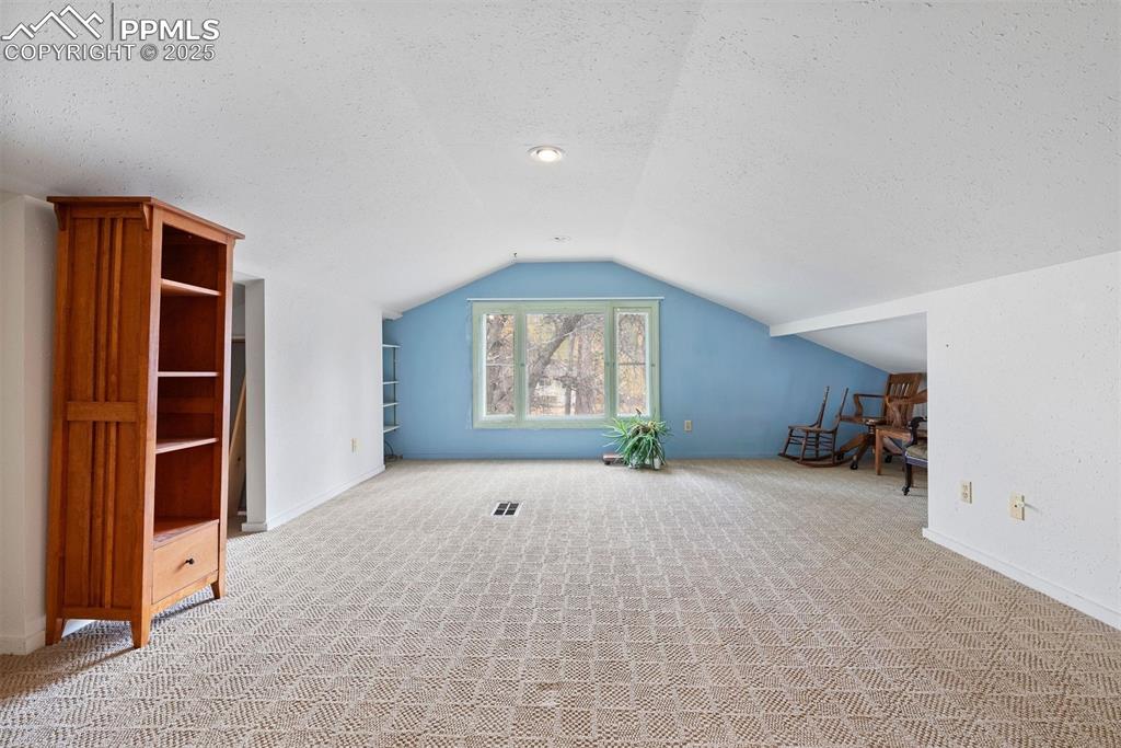 1515 West Cheyenne Road Colorado Springs, CO 80906 - Photo 36 of 50 an empty room with closet and a window