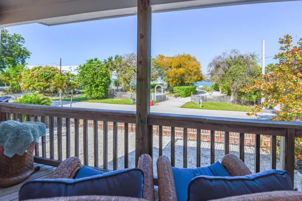 a view of a porch with furniture