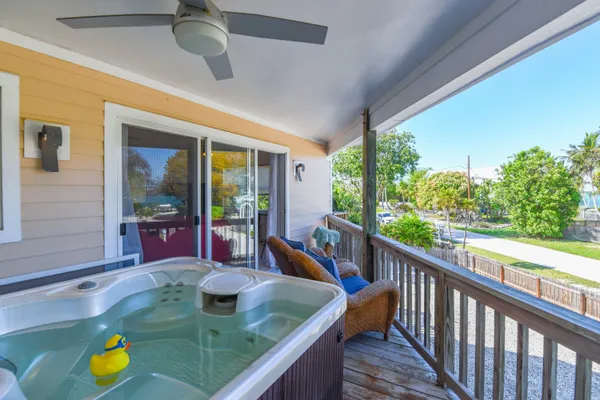a view of swimming pool with seating area