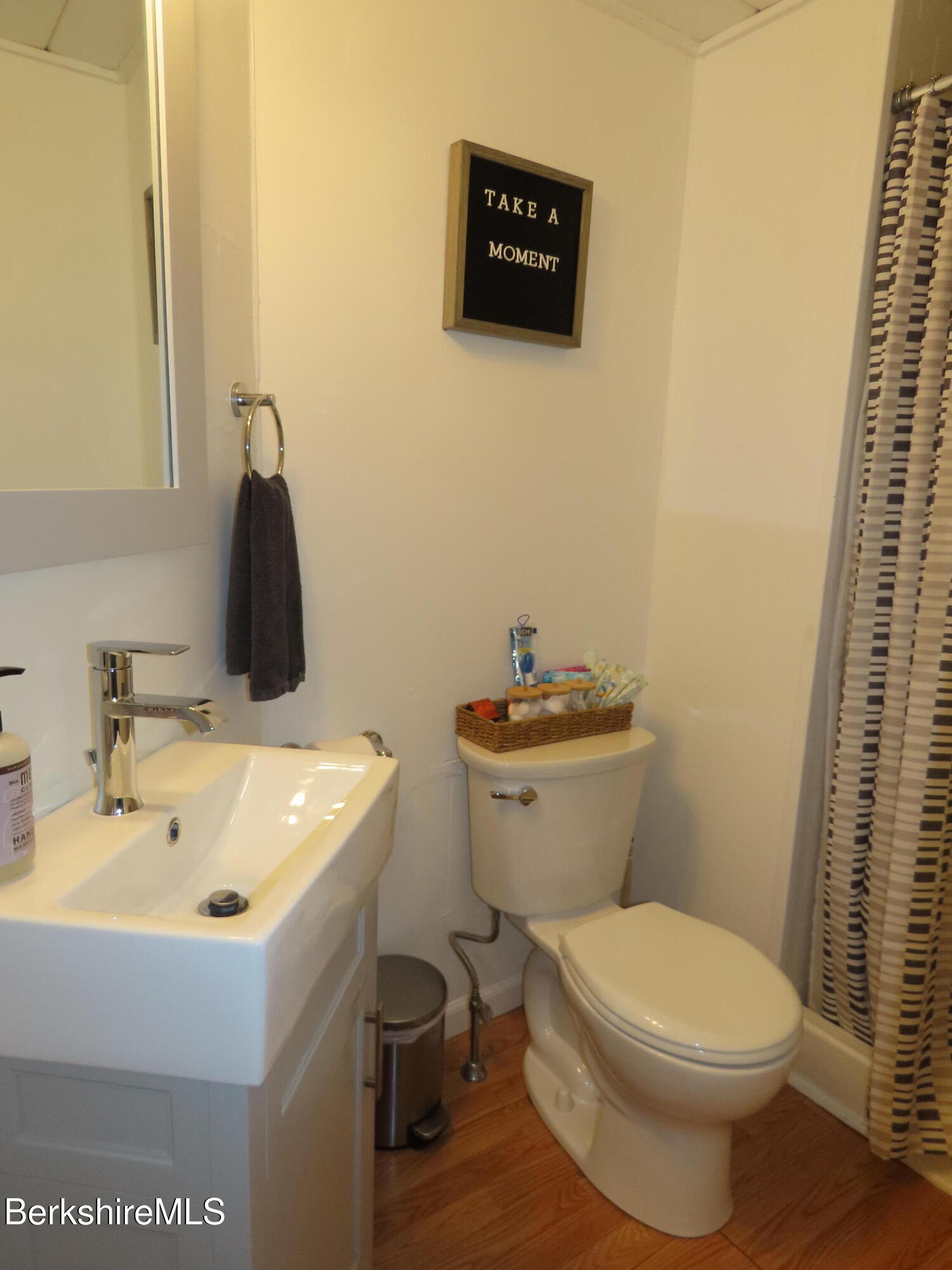 19 Church Street, Unit 12 North Adams, MA 01247 - Photo 12 of 16 a bathroom with a sink and a toilet