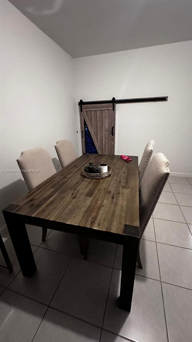12961 Southwest 230th Street Miami, FL 33170 - Photo 30 of 39 a living room with furniture and wooden floor