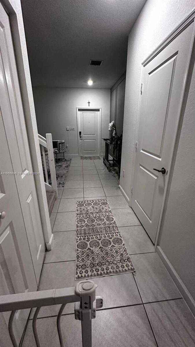 12961 Southwest 230th Street Miami, FL 33170 - Photo 36 of 39 a view of an entryway with a rug
