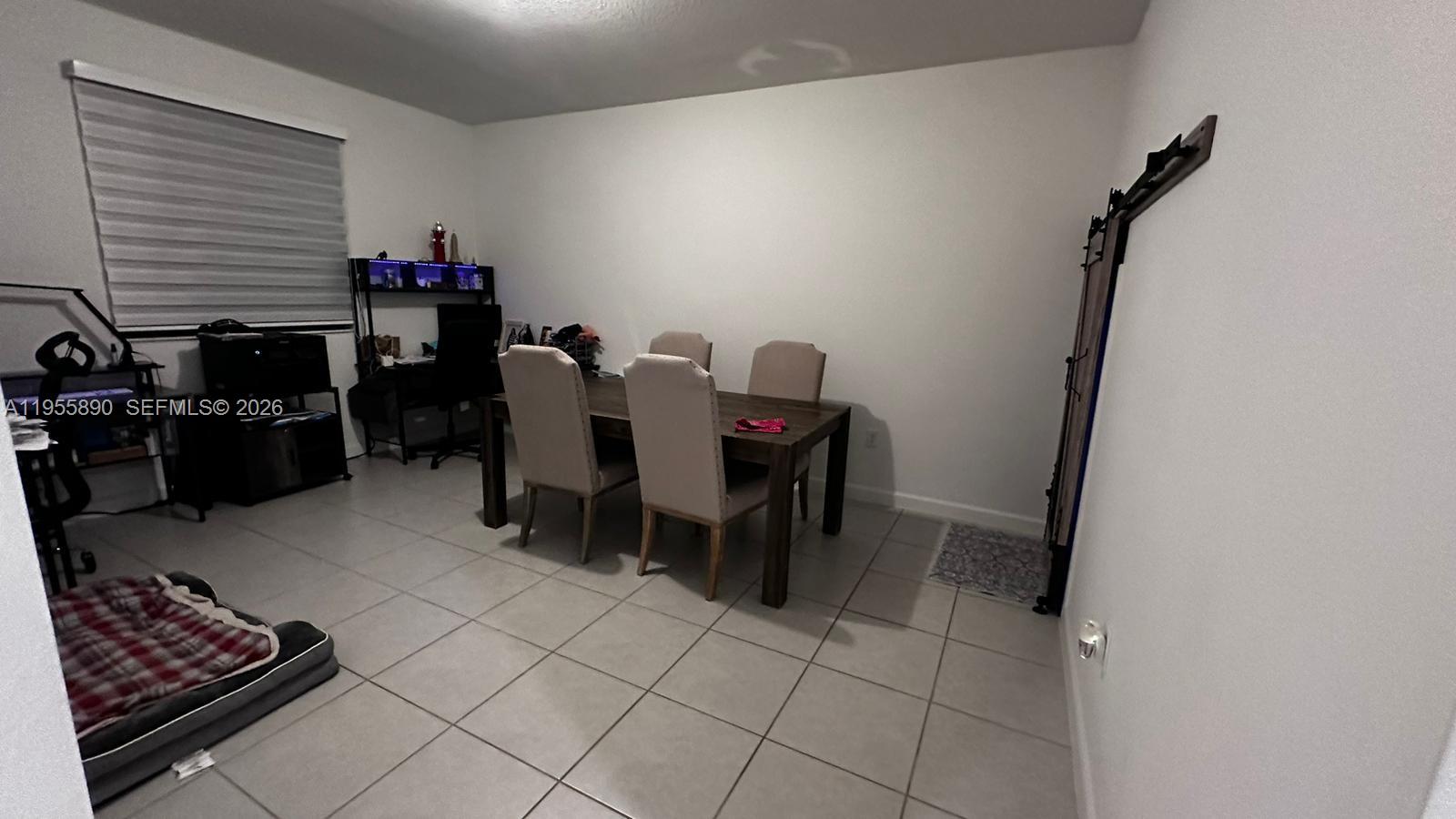 12961 Southwest 230th Street Miami, FL 33170 - Photo 38 of 39 a view of a workspace with furniture