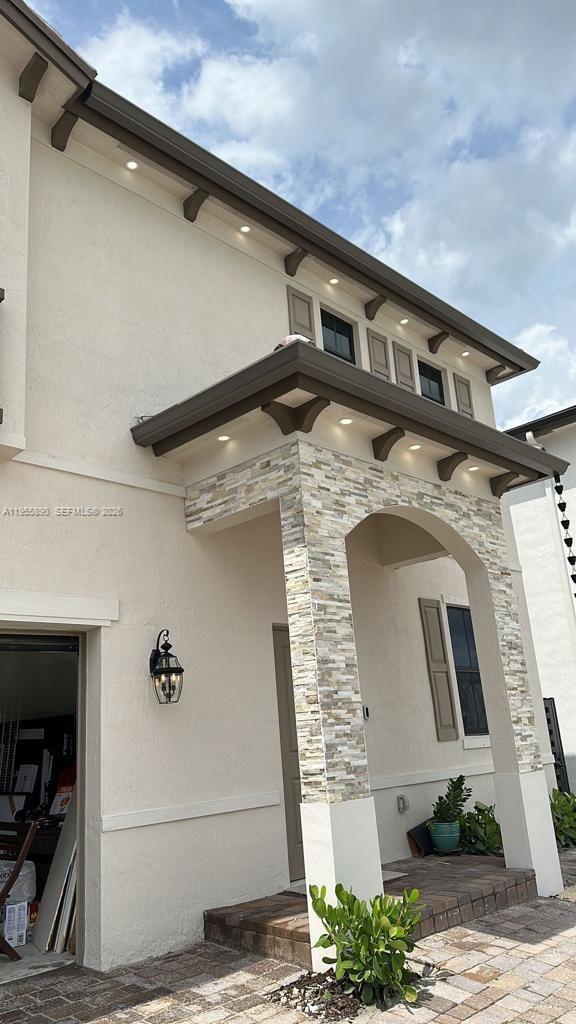 12961 Southwest 230th Street Miami, FL 33170 - Photo 7 of 39 a front view of a house