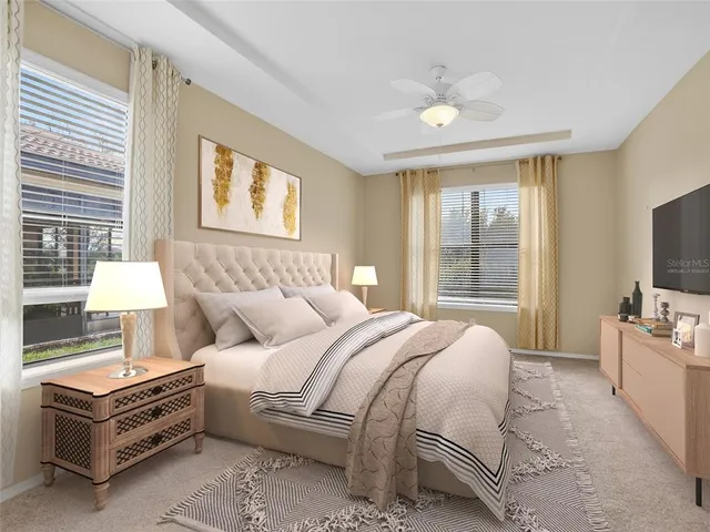 a bathroom with a granite countertop double vanity sink and a mirror