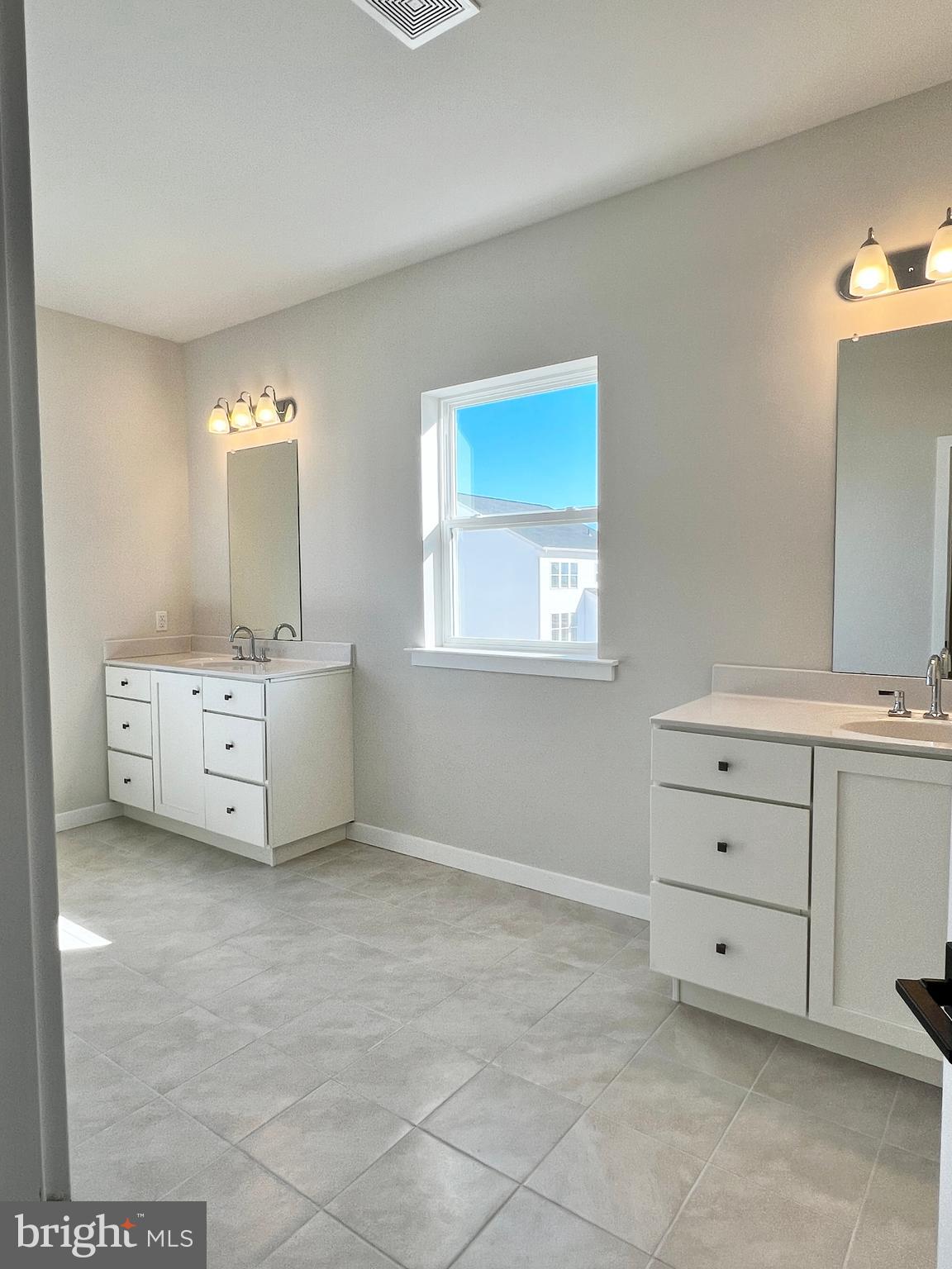 1018 East Lock Road Middletown, DE 19709 - Photo 34 of 51 a view of a bedroom with cabinets and window