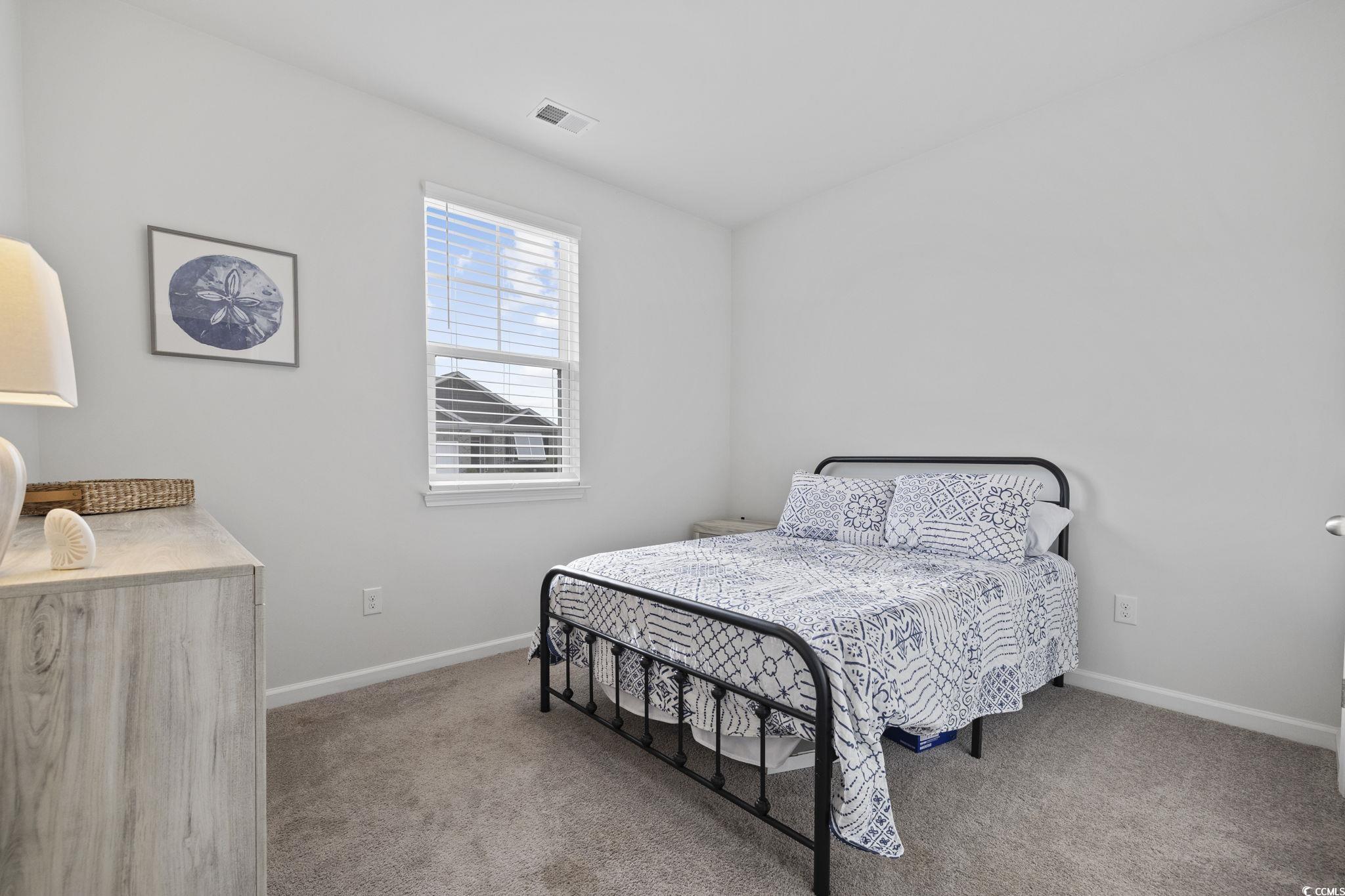 2816 Ophelia Way Myrtle Beach, SC 29577 - Photo 10 of 39 Bedroom featuring carpet