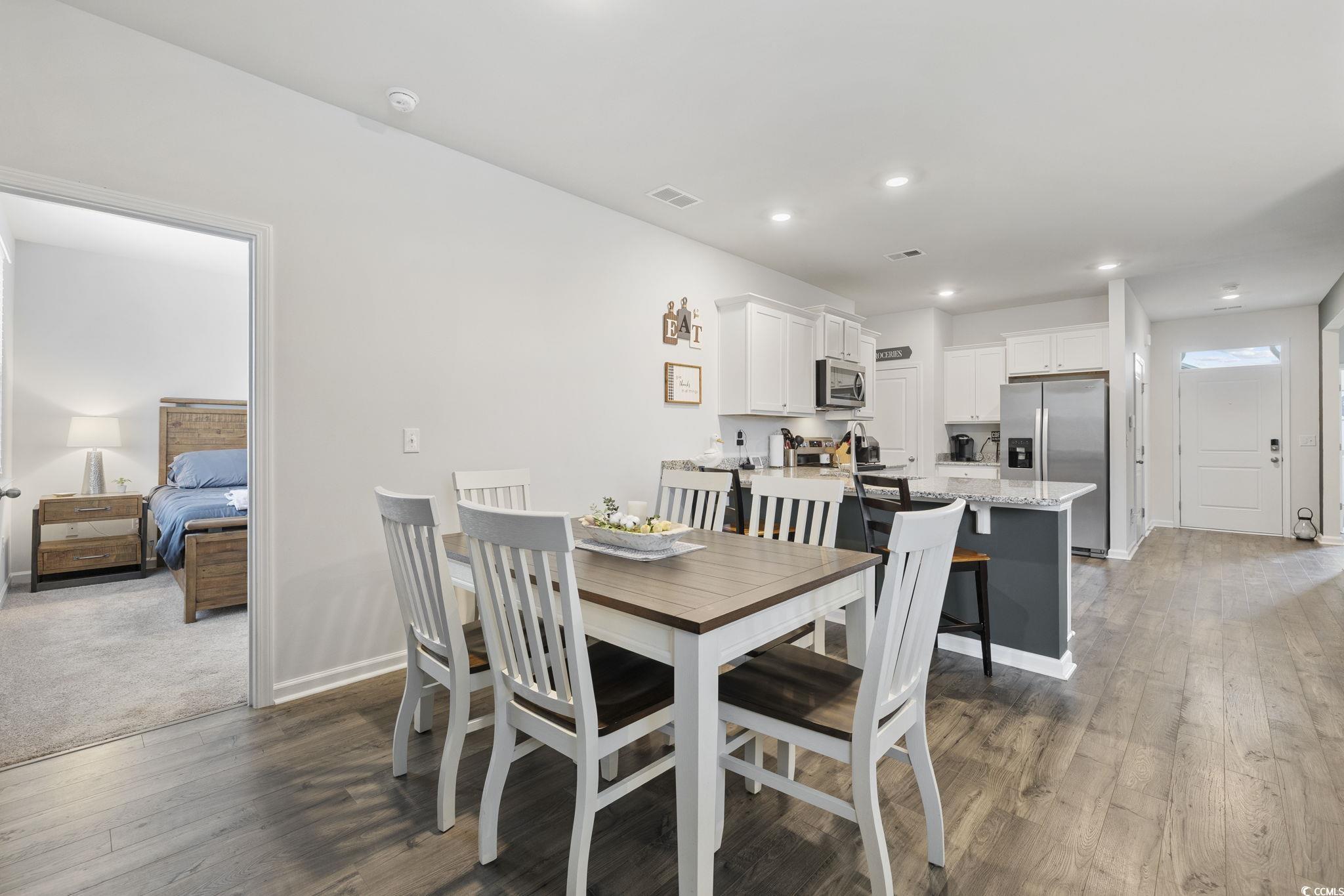 2816 Ophelia Way Myrtle Beach, SC 29577 - Photo 17 of 39 Dining area featuring dark wood finished floors and recessed lighting