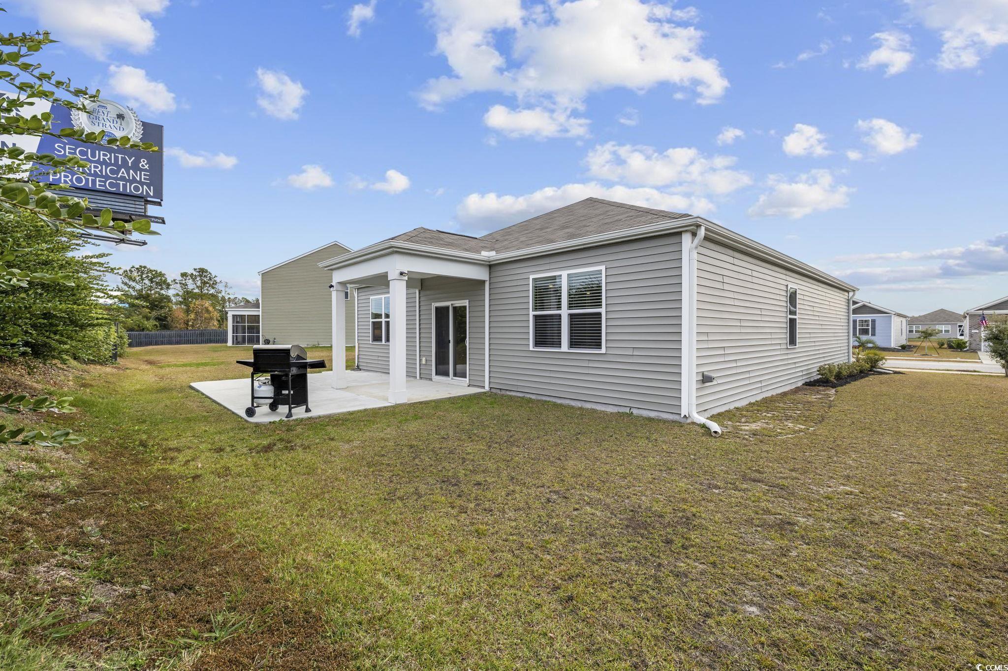 2816 Ophelia Way Myrtle Beach, SC 29577 - Photo 27 of 39 Rear view of house with a patio