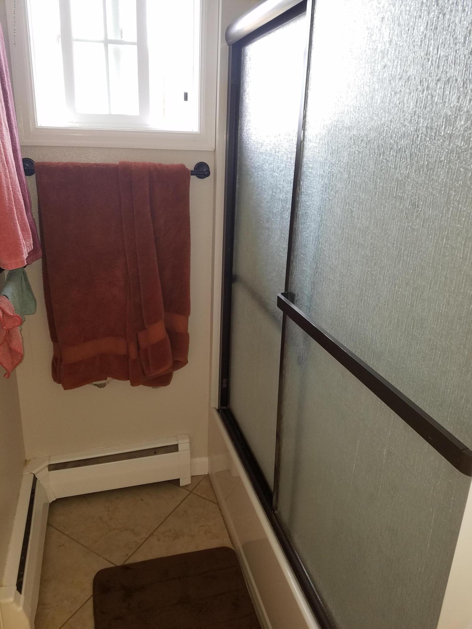 730 Green Street Craig, CO 81625 - Photo 13 of 34 a bathroom with a window