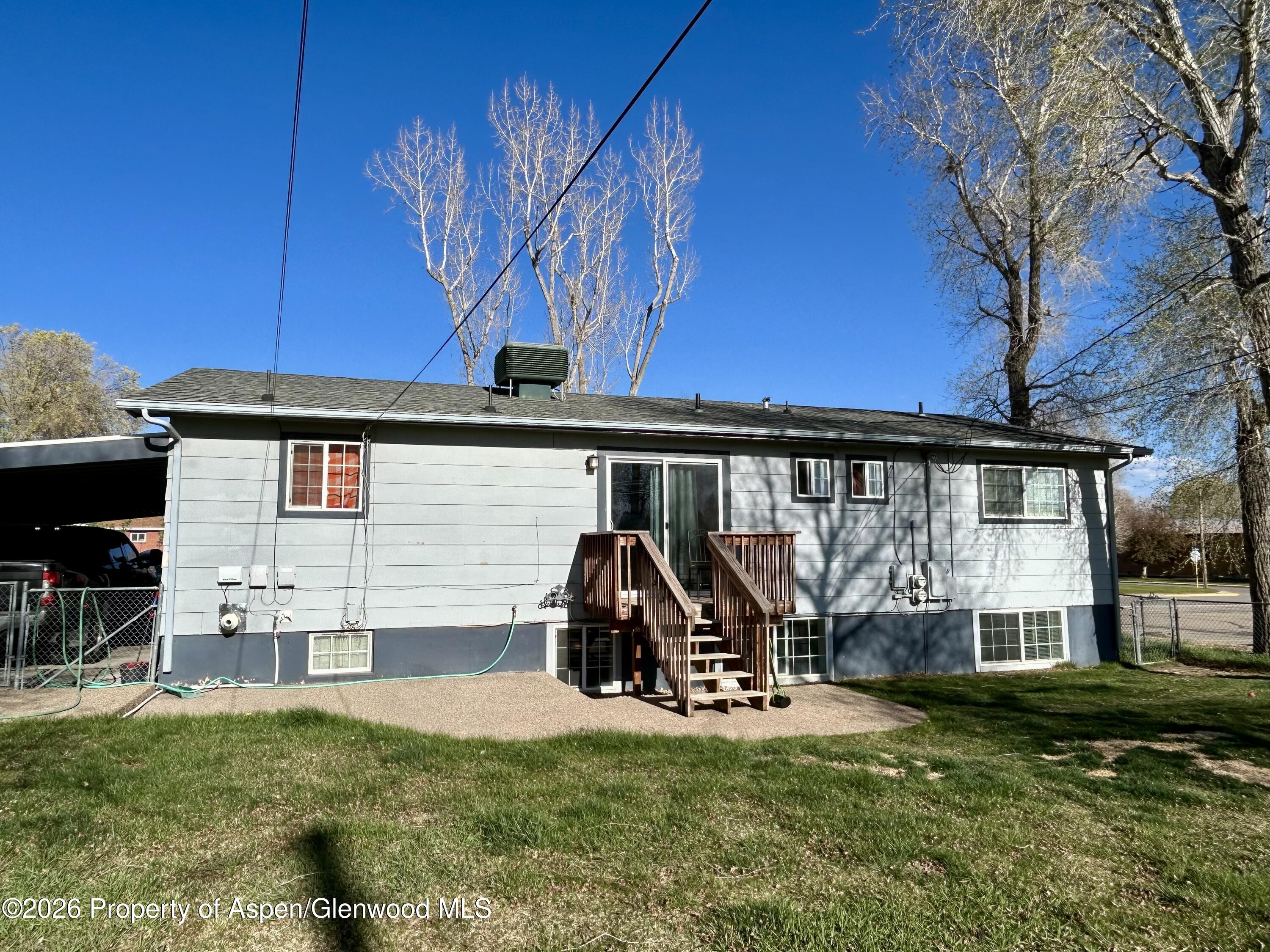 730 Green Street Craig, CO 81625 - Photo 29 of 34 a view of a house with backyard