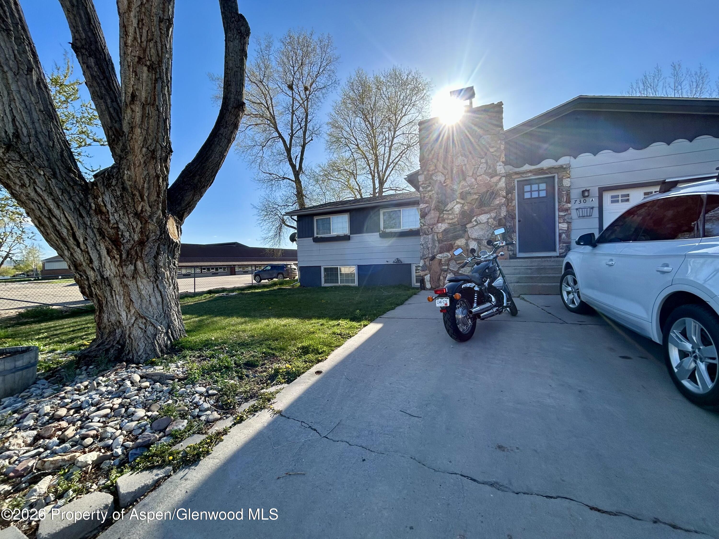 730 Green Street Craig, CO 81625 - Photo 4 of 34 a view of a car is parked in front of house