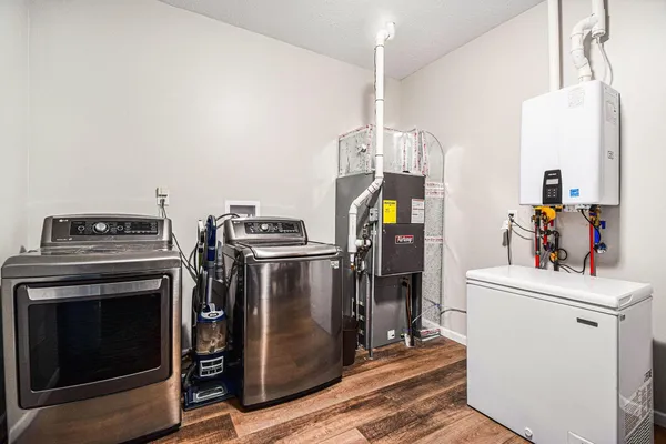 a utility room with dryer and washer