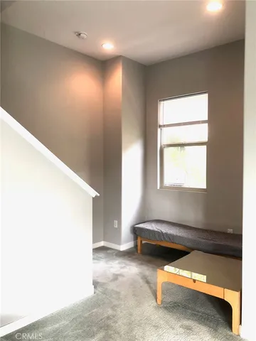 a view of a room with a hallway
