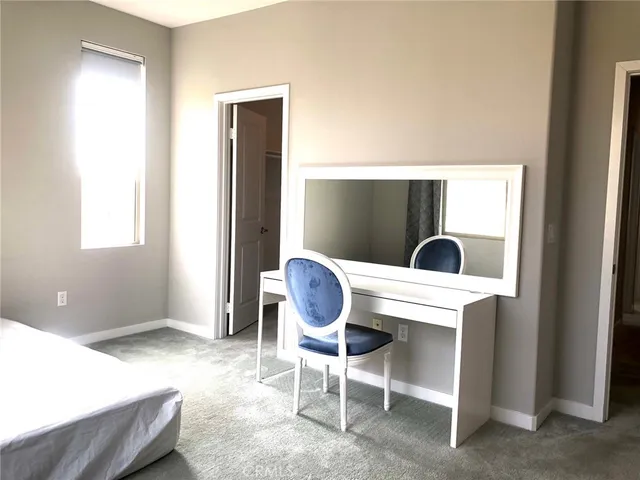 a bathroom with a shower and a sink