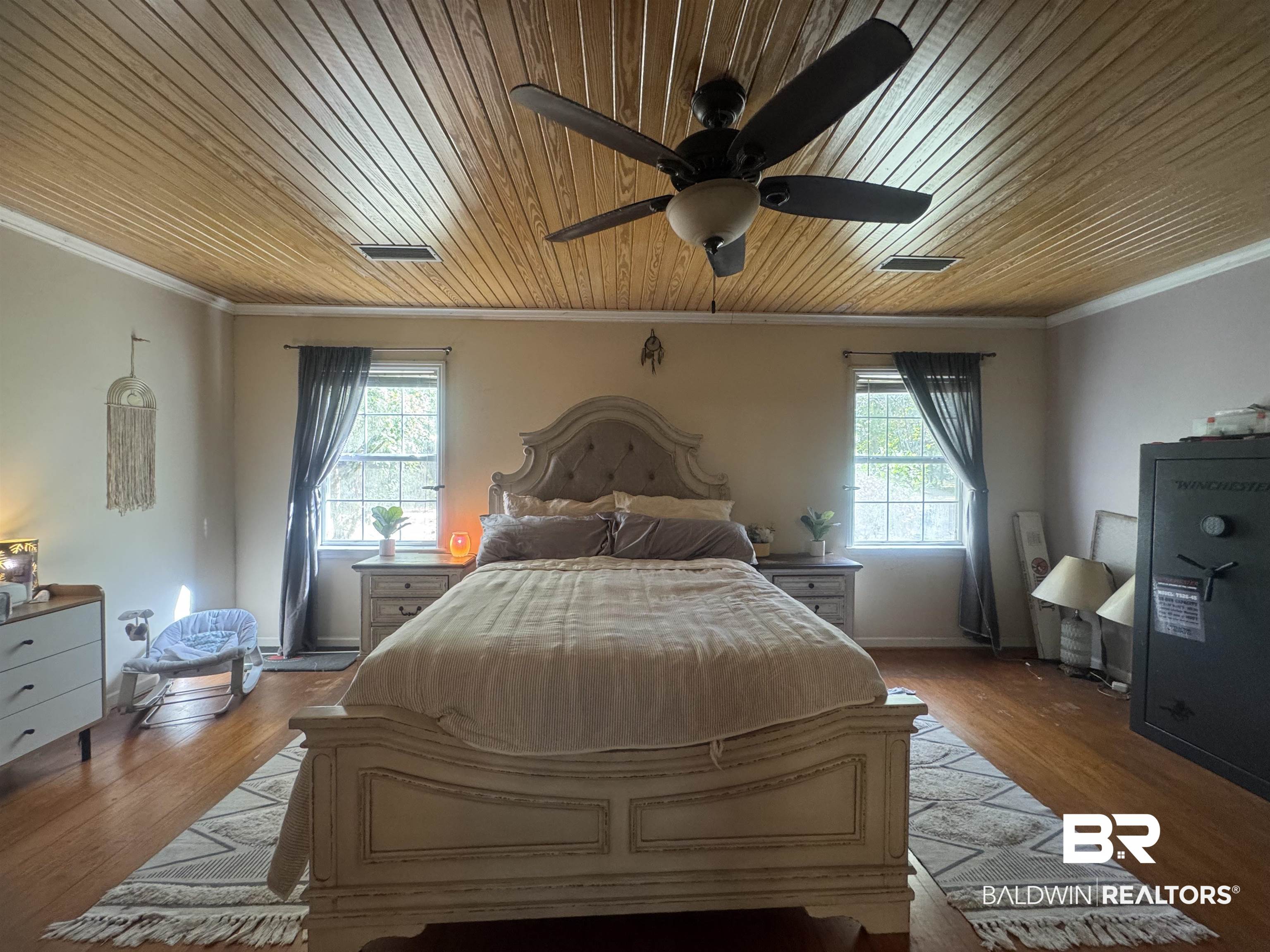 3097 Old Castleberry Road Brewton, AL 36426 - Photo 20 of 49 Bedroom featuring light hardwood / wood-style floors, crown molding, multiple windows, and ceiling fan
