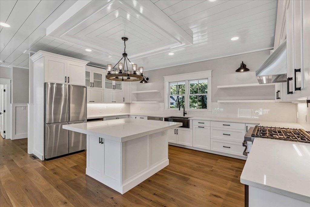 58 Amos Landing Road Mashpee, MA 02649 - Photo 19 of 42 a kitchen with a stove a refrigerator and a oven