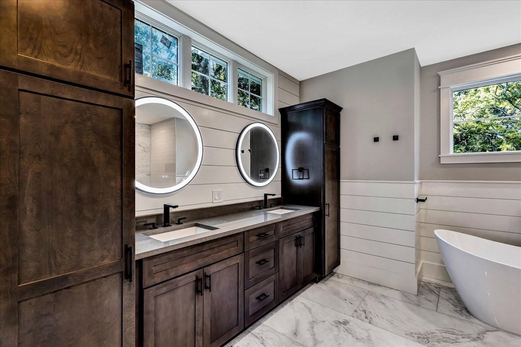 58 Amos Landing Road Mashpee, MA 02649 - Photo 31 of 42 a bathroom with a toilet a sink and bathtub