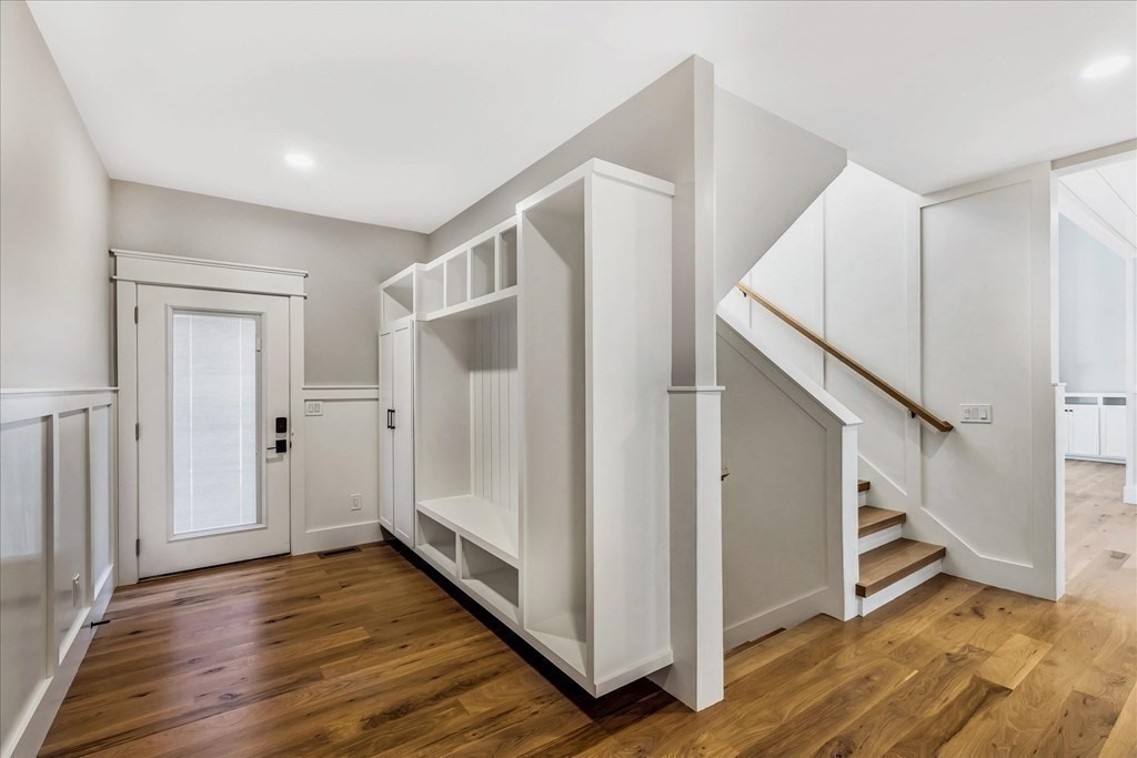 58 Amos Landing Road Mashpee, MA 02649 - Photo 32 of 42 a view of a hallway with wooden floor and entryway