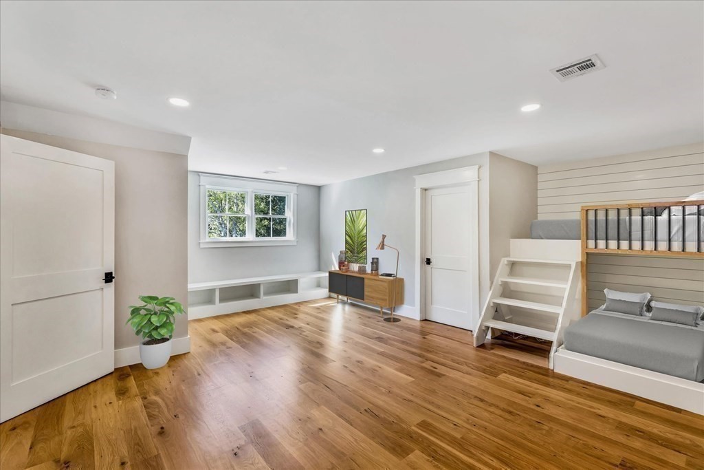 58 Amos Landing Road Mashpee, MA 02649 - Photo 39 of 42 a view of a livingroom with wooden floor and furniture