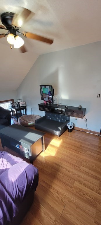 1010 Middle Street Fall River, MA 02721 - Photo 13 of 25 a bedroom with bed and a chandelier