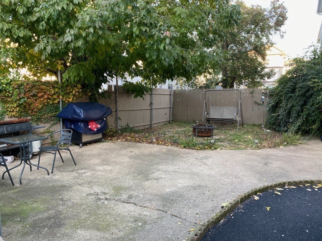 1010 Middle Street Fall River, MA 02721 - Photo 8 of 25 a backyard of a house with entertaining space