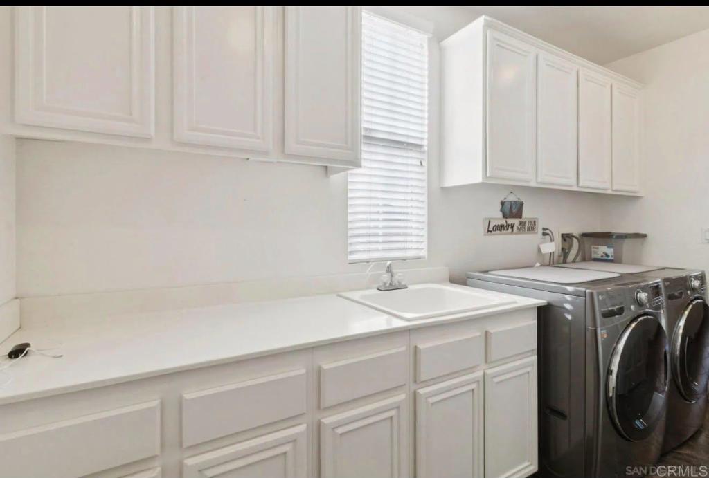 1234 Old Janal Ranch Road Chula Vista, CA 91915 - Photo 32 of 34 a utility room with sink dryer and washer