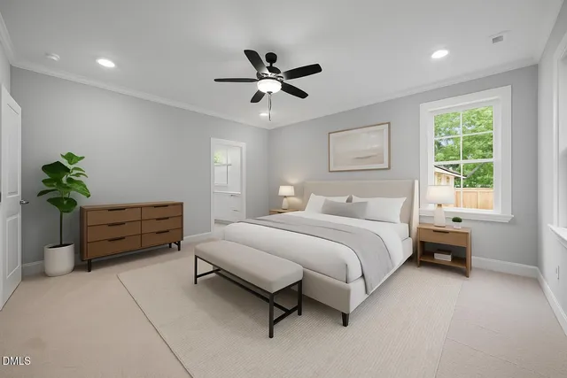 a bedroom with furniture and a window