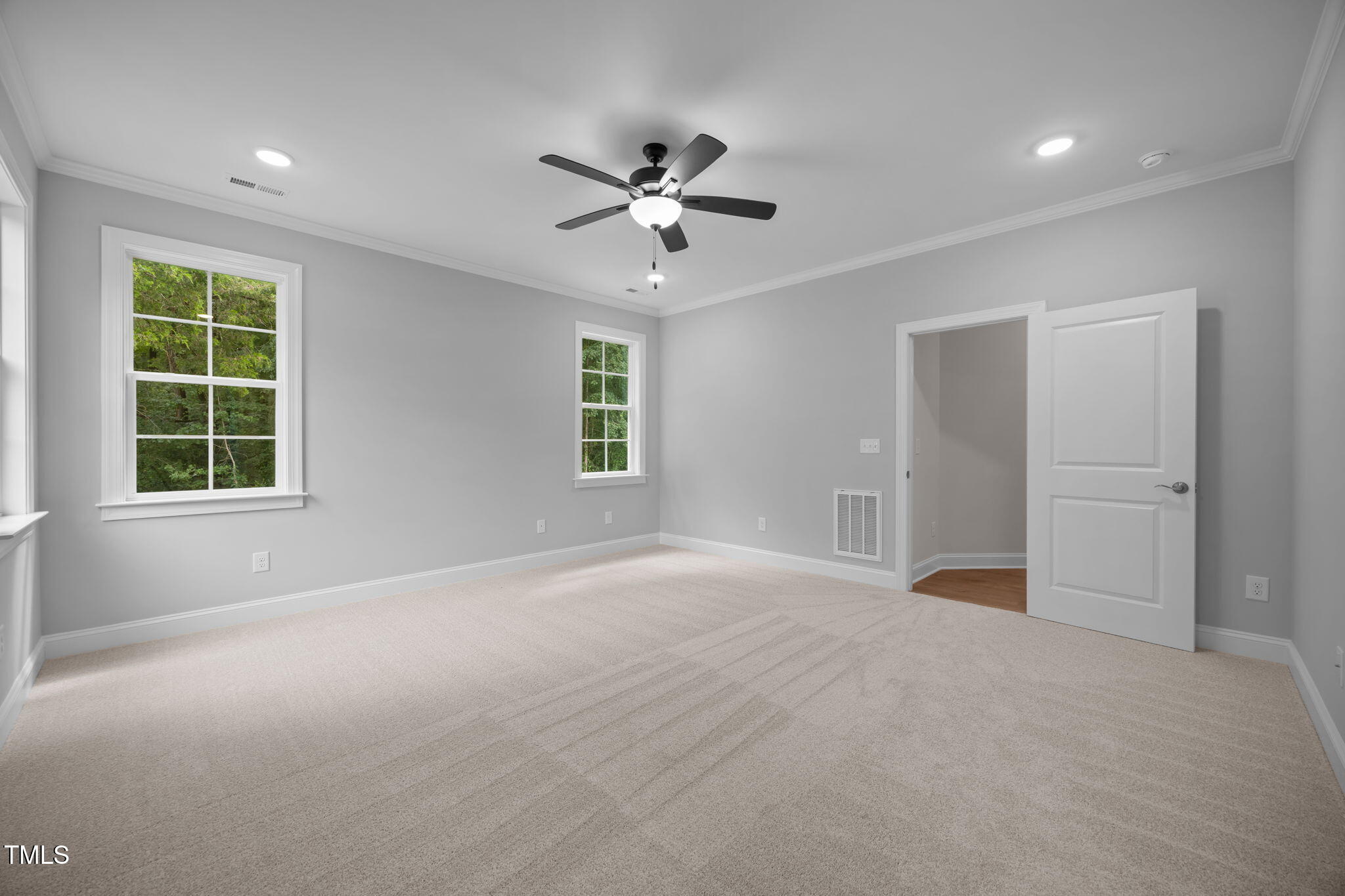 109 Drew Street Louisburg, NC 27549 - Photo 14 of 30 a view of an empty room with a window