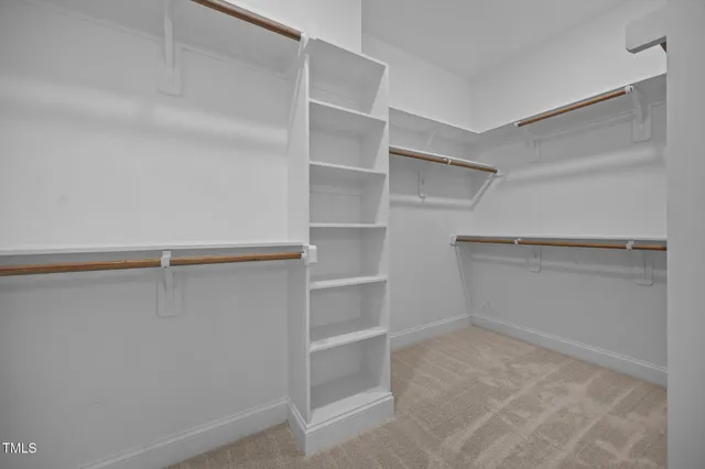 a view of an empty walk in closet