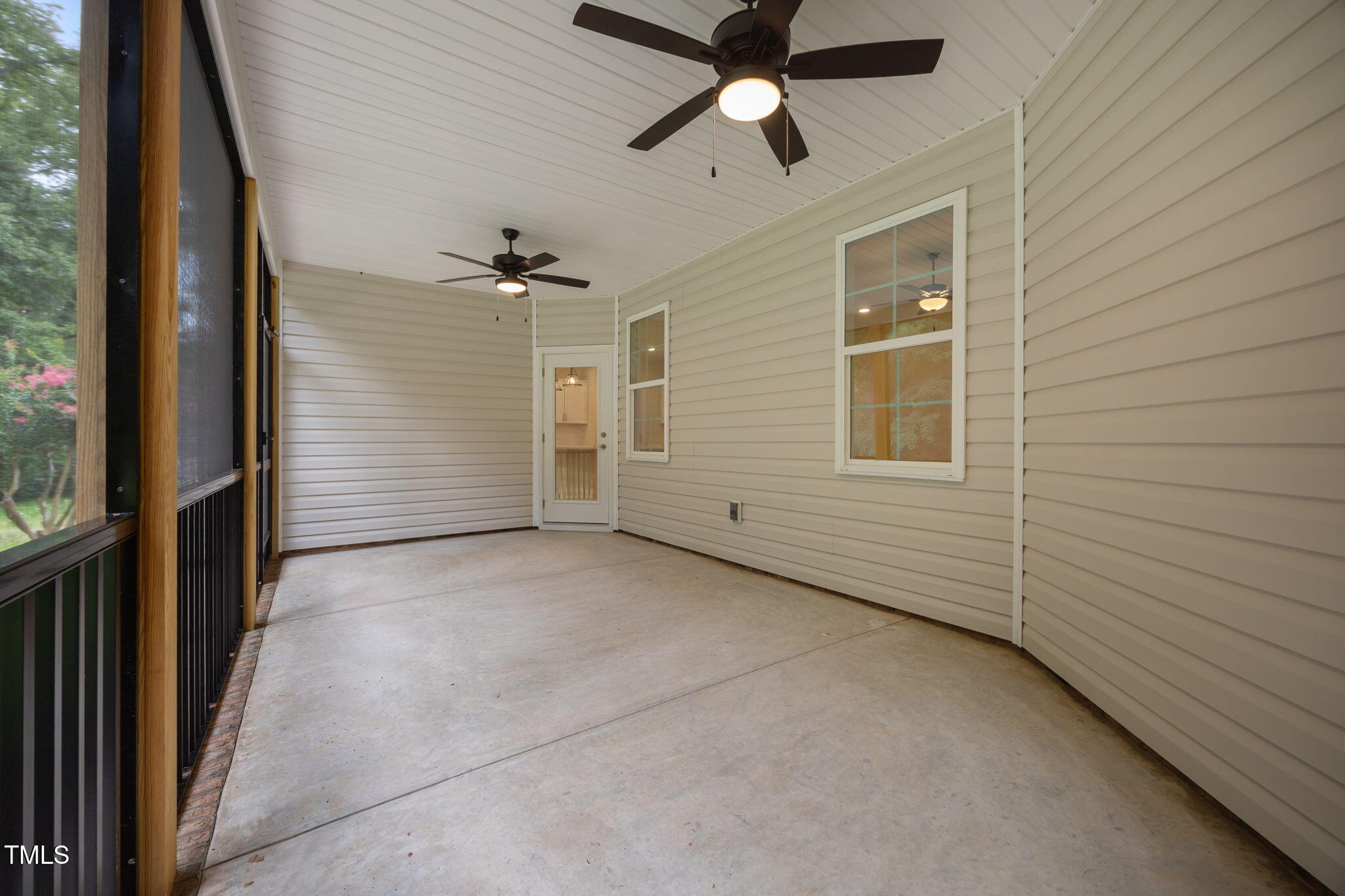 109 Drew Street Louisburg, NC 27549 - Photo 24 of 30 a view of a livingroom with a ceiling fan and window