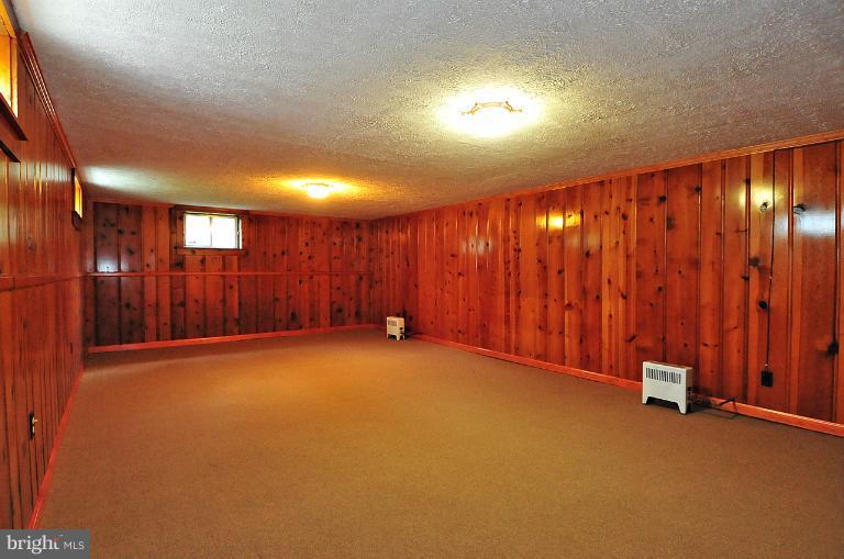 205 Hawthorne Road Linthicum Heights, MD 21090 - Photo 20 of 24 a view of an empty room with a window